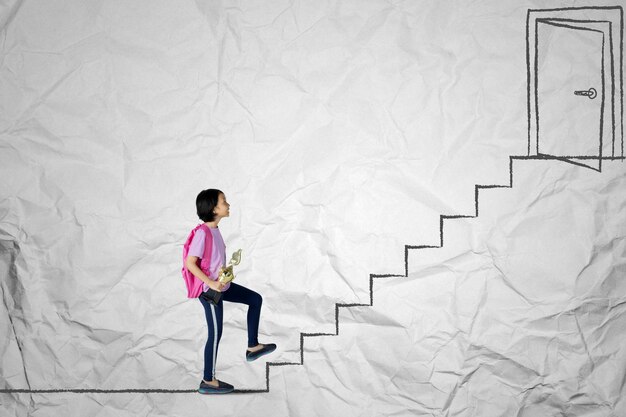 Photo digital composite image of girl holding trophy while moving up on steps against paper
