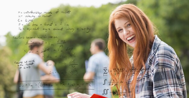 Цифровое составное изображение счастливой женщины с математическими уравнениями