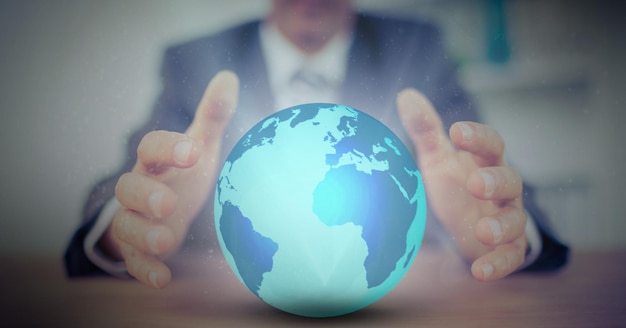 Фото Цифровое составное изображение средней части бизнесмена, держащего глобус. глобальная сеть и бизнес-концепция