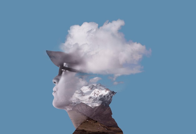 Digital composite of man and cloud against blue sky