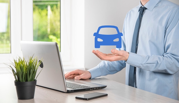 Photo digital composite of man holding car icon.car automobile insurance and car services concept. businessman with offering gesture and icon of car.