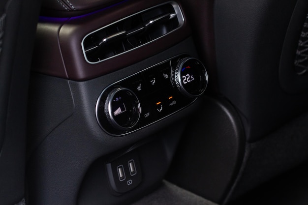 Digital control panel car air conditioner dashboard Modern car interior conditioning buttons inside a car close up view