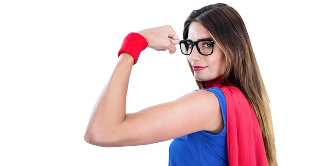 Digital illustration of a woman wearing a cape, flexing her biceps on a white background.