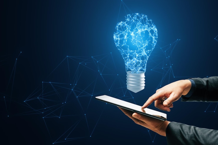 Photo a digital light bulb with a brain pattern above a tablet symbolizing innovation on a dark blue network background