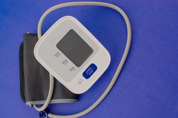 Digital pressure gauge person is checking blood pressure and\
heart rate with digital pressure gauge