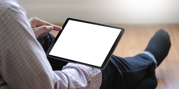 digital tablet computer close up man using tablet hands man multitasking 