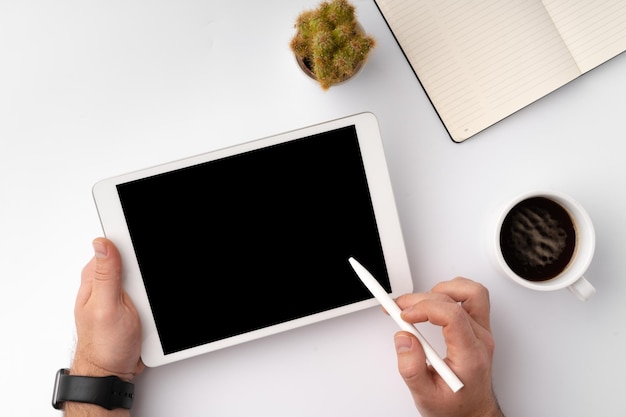 Digital tablet computer close up man using tablet with hands