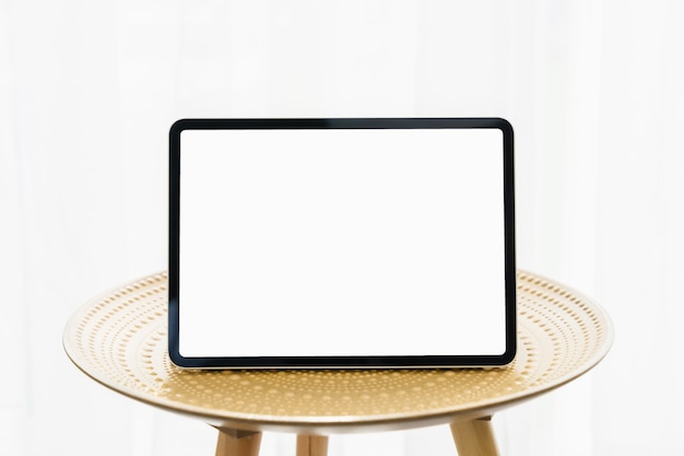 Digital tablet on a decorative table