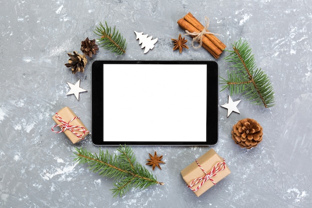 Digital tablet mock up with rustic Christmas gray cement