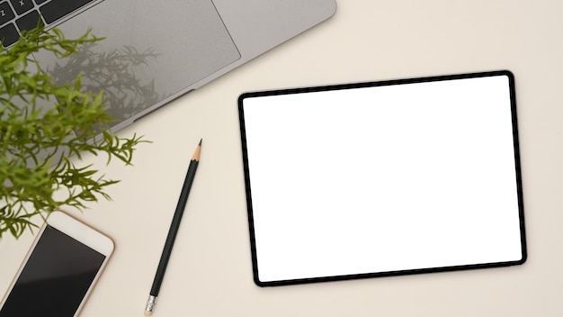 Digital tablet mockup pencil smartphone black screen laptop and decor plant on white background