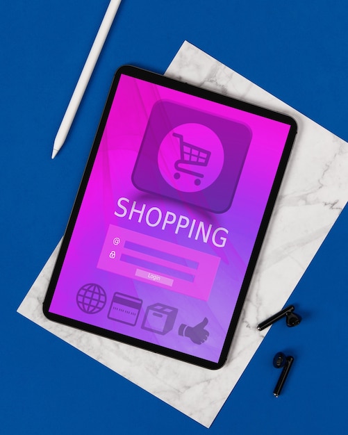 Photo digital tablet with online shop on screen on blue background