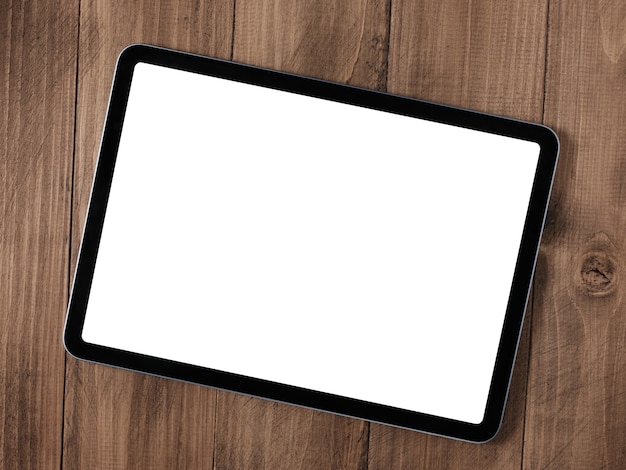 Photo digital tablet on wooden table with screen isolated