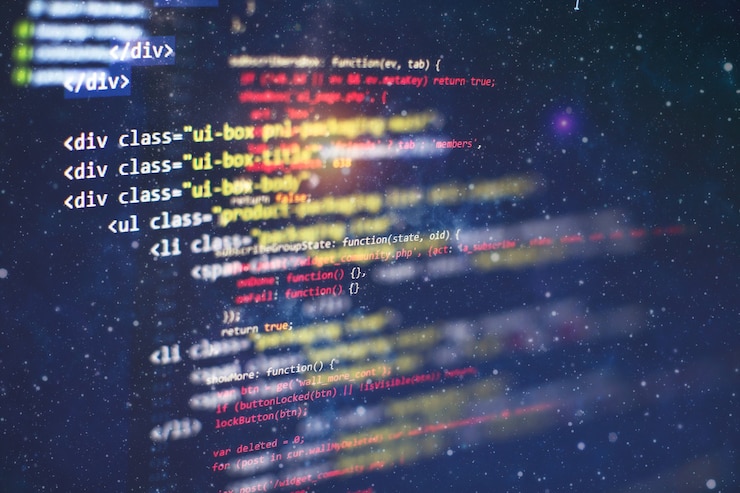 Photo digital technology on display. html5 in editor for website development. website html code on the laptop display closeup photo.