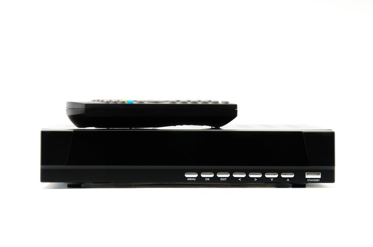 Digital TV tuner with remote control on an isolated white