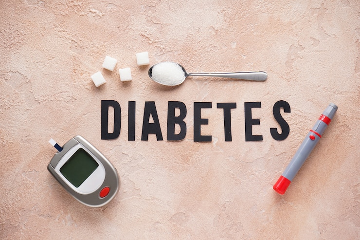 Foto digitale glucometer, lancetpen en suiker