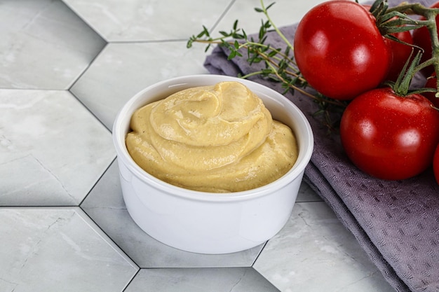 Dijon mustard sauce in the bowl