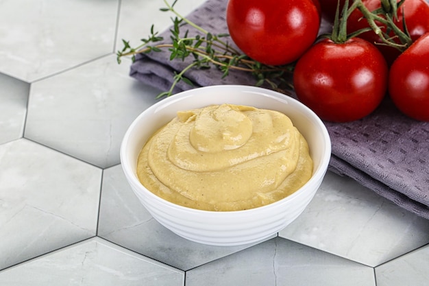 Dijon mustard sauce dip in the bowl