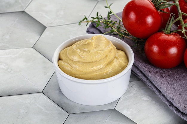 Dijon mustard sauce dip in the bowl