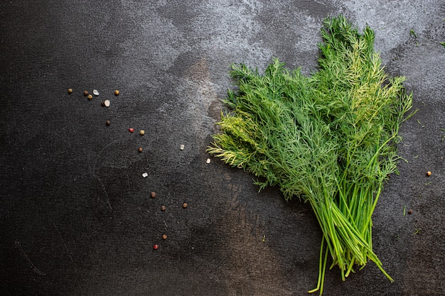 Photo dill, fresh green herb bunch preparation for freezing serving size