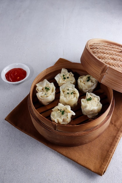 Dimsum or Steamed dumpling in bamboo steamer