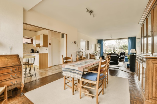 The dining room and living room of a house with