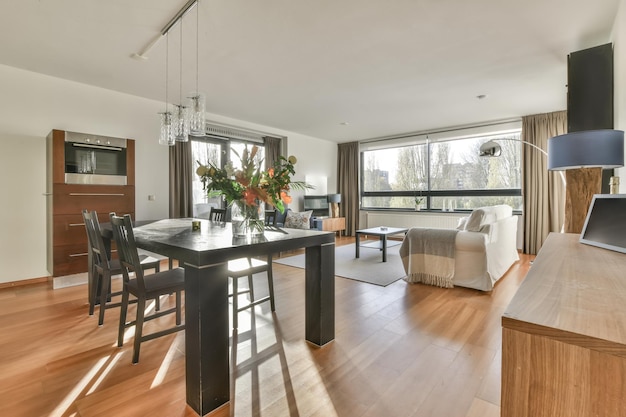 Dining room with white furniture in modern apartment