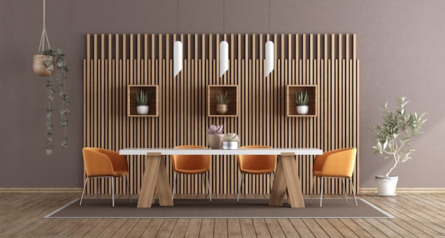 Dining room with white table and orange chairs