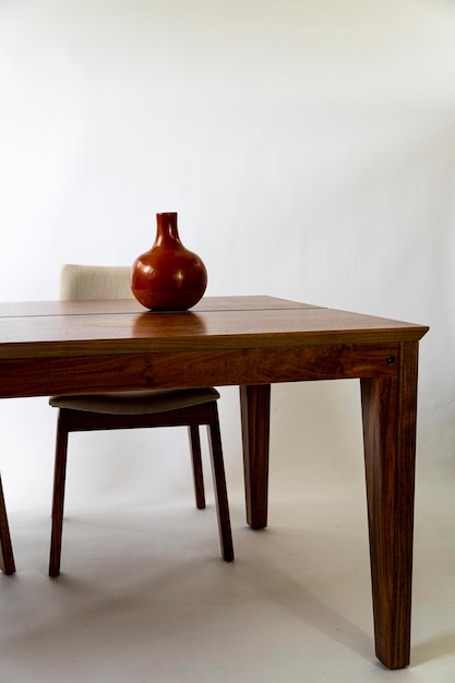 Dining table ready for dinner on white background design furniture mexico