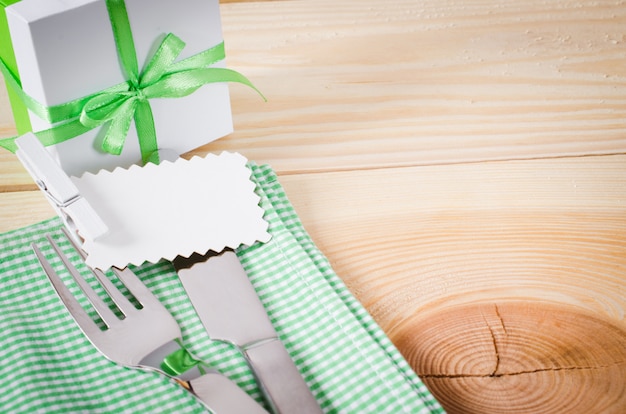 Dining Table Setting. Cutlery with Empty Tag and Present.