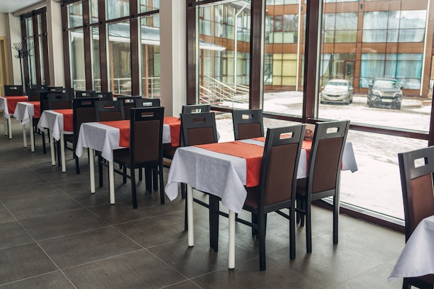 Dining tables and chairs in the restaurant. light interior