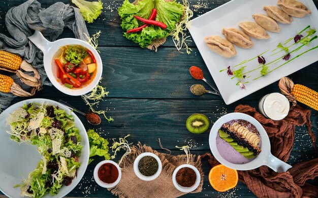 Dinner A set of food On a wooden background Top view Copy space