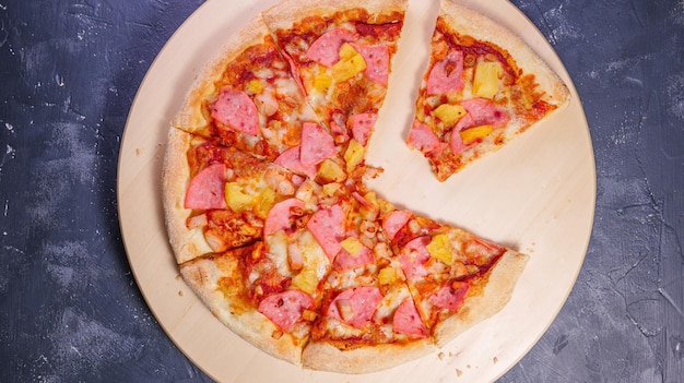 Dipped slices of pizza on the table