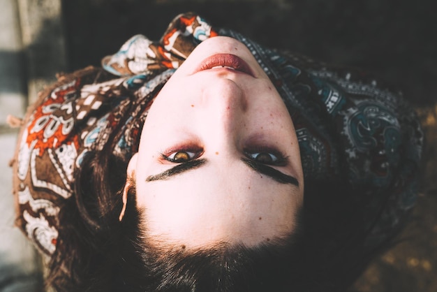 Photo directly above portrait of woman standing outdoors