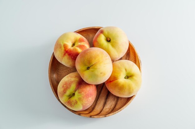 Directly above shot of apples in bowl against white background