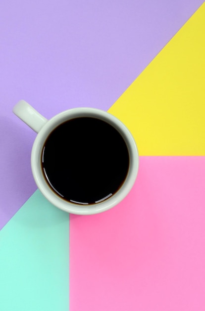 Directly above shot of black coffee cup on table