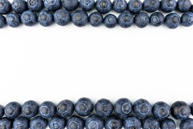 Photo directly above shot of blueberries on white background