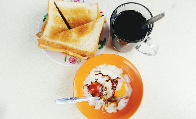 Photo directly above shot of breakfast on white background