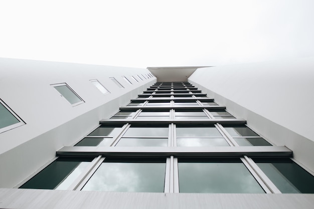 directly below shot of building against clear sky