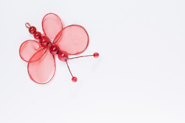 Photo directly above shot of butterfly decoration on white background