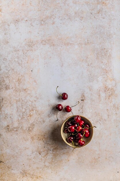 Directly above shot of cherries in bowl