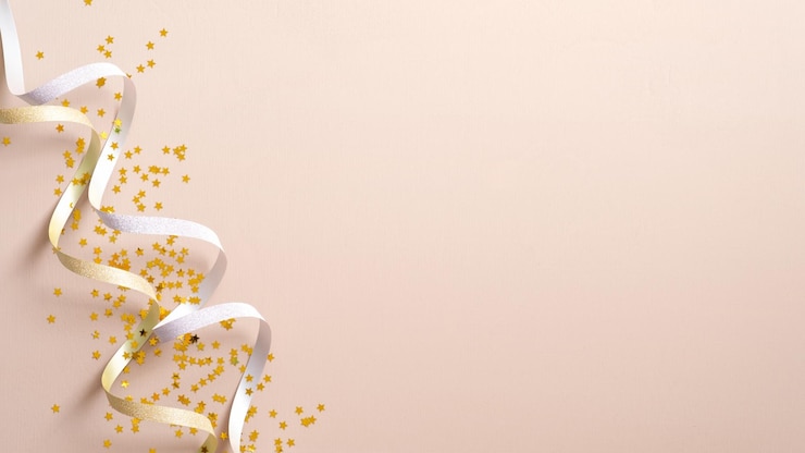 Photo directly above shot of christmas decorations against pink background