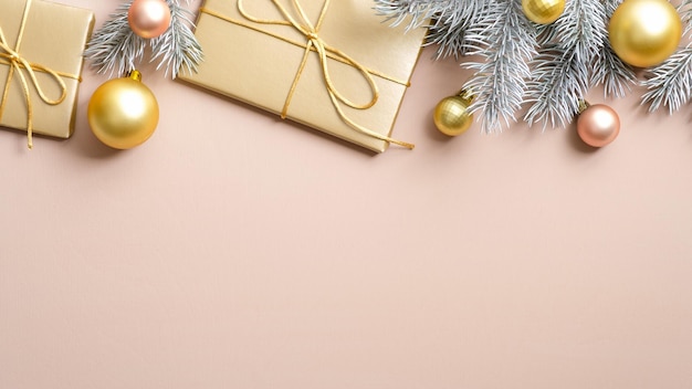 Directly above shot of christmas decorations against pink background