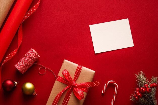 Directly above shot of christmas decorations on red background