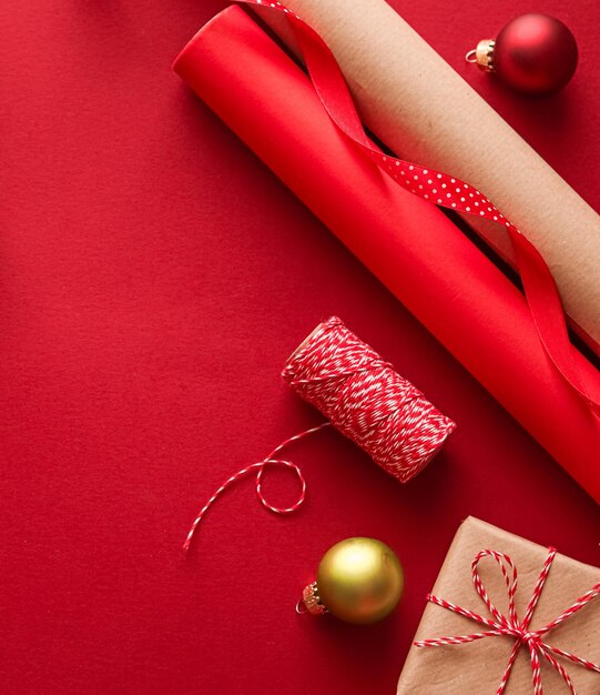 Directly above shot of christmas decorations on red background