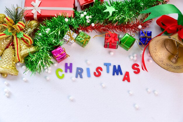 Directly above shot of christmas decorations on white table