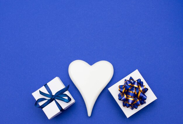 Directly above shot of christmas presents against blue background