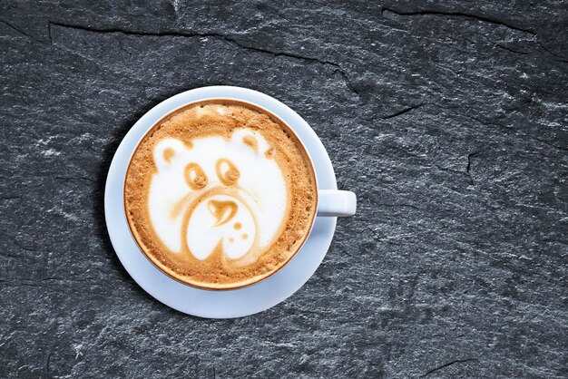 Directly above shot of coffee in cup on table