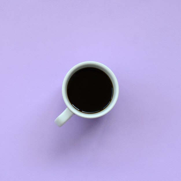 Directly above shot of coffee cup on table