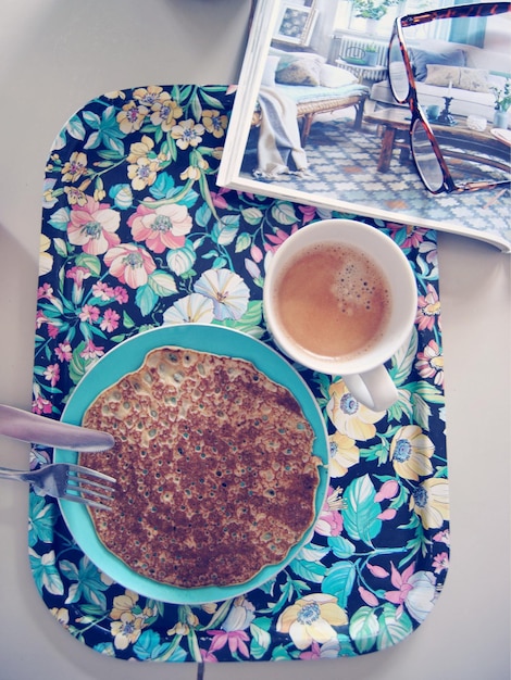 Photo directly above shot of coffee cup on table