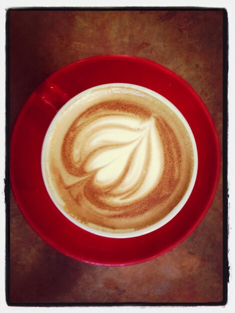 Photo directly above shot of coffee with froth art